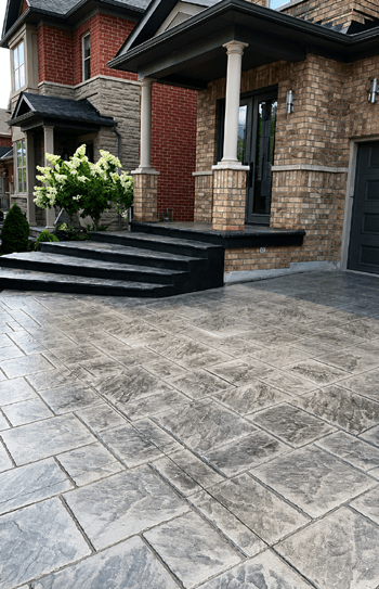 Stamped Concrete Driveway by J.M.C. Concrete & Interlocking